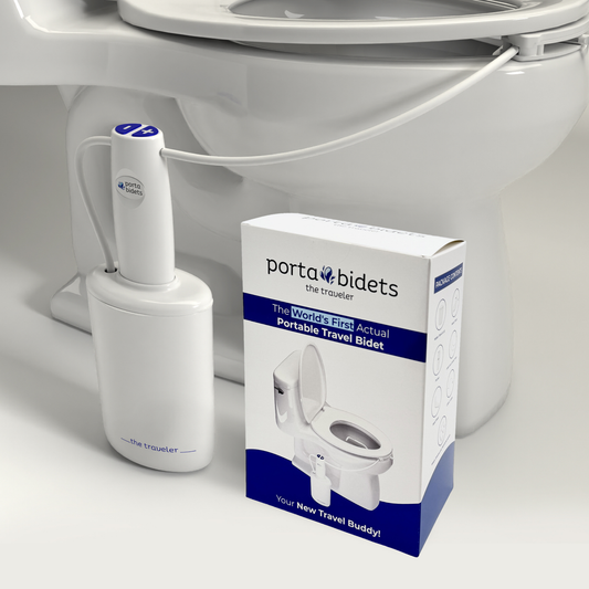 Portable bidet and its packaging in front of a toilet
